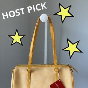 “Vintage” Dooney & Bourke Canvas Barrel Bag